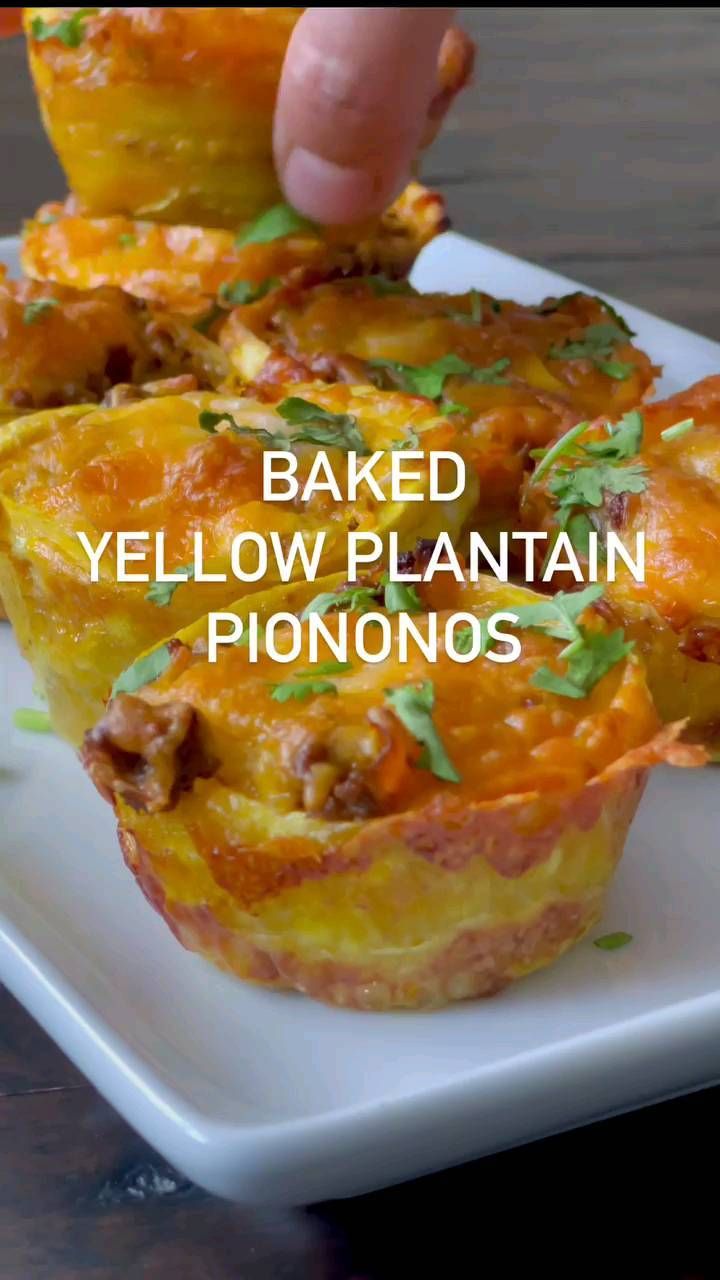 baked yellow plantain pies on a plate with the words baked yellow plantain pionnos