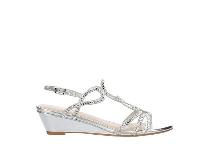 Maripe Selena Women s Wedge Sandal Tread grandly in the Maripe Selena women s wedge Sandal. With a sequined upper featuring a loopy design for extra flair, this buckled slingback strap Sandal adds some glamour to your look. The footbed soothes your foot, while the low wedge heel offers stable lift. Sequined upper Slingback buckle strapSquare peep toeLightly Padded footbed 2 wedge heel Elegant Summer Wedge Sandals With Rhinestones, Elegant Rhinestone Wedge Sandals For Summer, Silver Wedge Sandals For Spring Wedding, Embellished Wedge Sandals For Summer Party, Glamorous Summer Wedge Sandals With Rhinestones, Elegant Silver Wedge Sandals For Spring, Glamorous Summer Wedding Wedge Sandals, Silver Rhinestone Wedge Sandals, Glamorous Spring Wedding Wedge Sandals