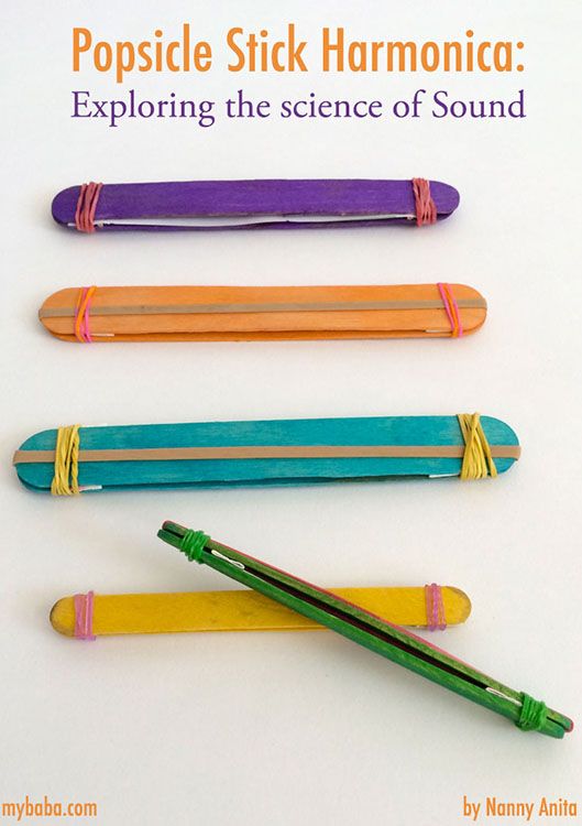 popsicle stick harmonicas are lined up in the shape of four different colored sticks