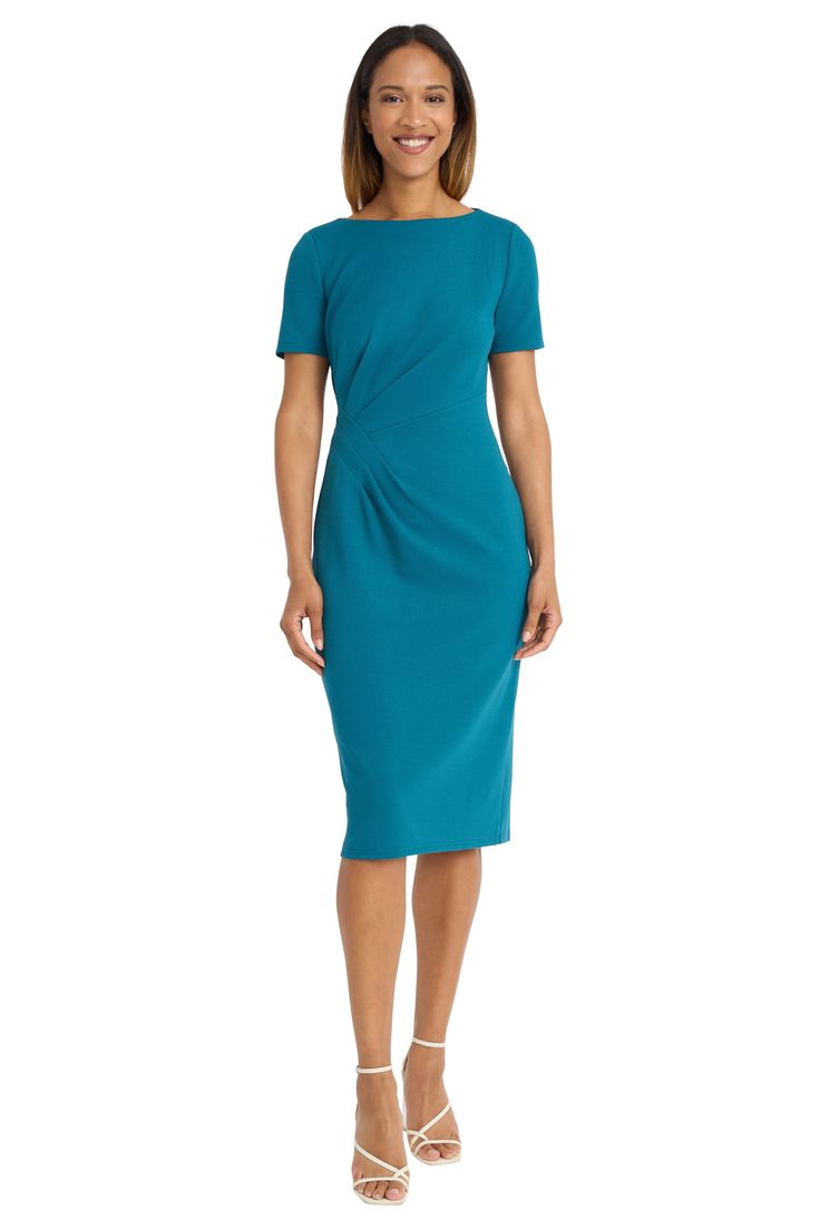 Introducing Bebe, the epitome of sleek sophistication. This form-fitting midi dress features a boat neckline, short sleeves, and subtle side ruching for a flattering silhouette. Perfect for the office, client meetings, or dressed up for evening events. Pair Bebe with pumps and statement earrings for a polished look, or add a blazer for a professional ensemble that commands attention. Turquoise Knee-length Summer Midi Dress, Casual Turquoise Knee-length Dress, Casual Turquoise V-neck Dress, Missy Dresses, Bearded Lady, Short Sleeve Shift Dress, Maggy London, Daytime Dresses, Boat Neckline