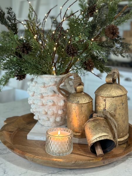 a tray with some candles and decorations on it