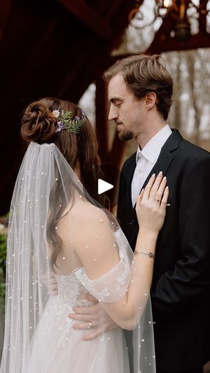 a bride and groom standing next to each other