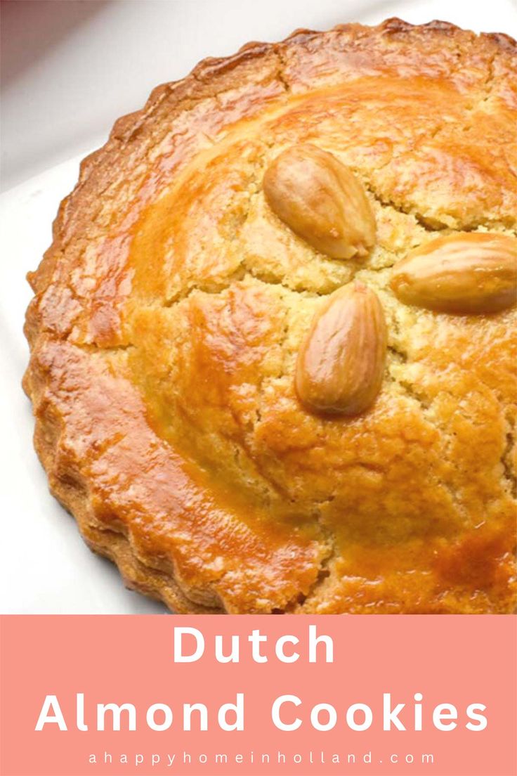 a close up of a pie with almonds on it and the words dutch almond cookies