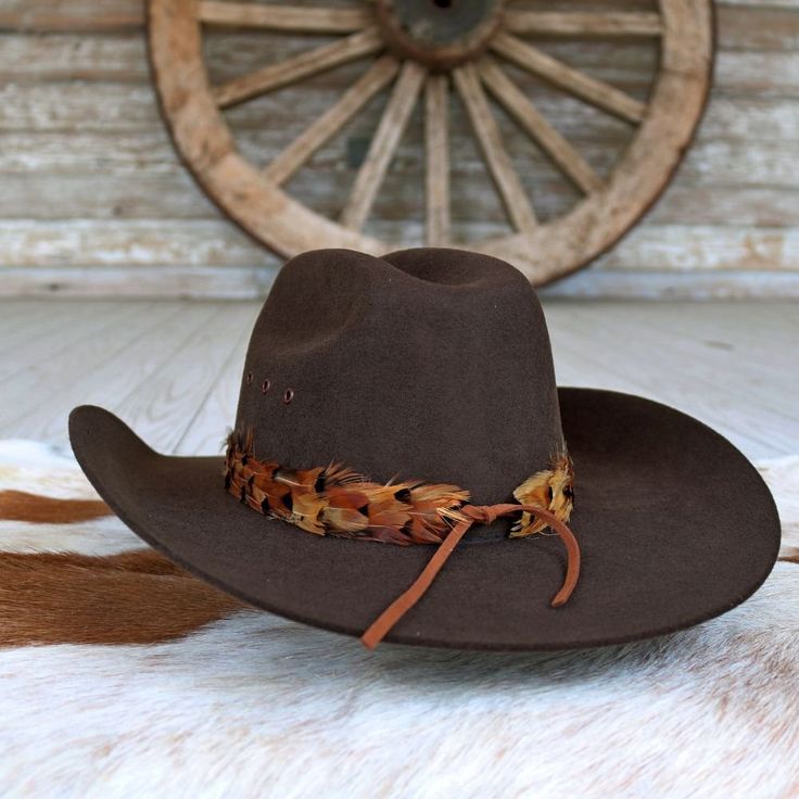 The Stellar (short) is a smaller version of our best selling hat band. Specially designed for small sized hats (6 7/8 and under) and kids hats.    100% Feather  Length: approx. 53cm (not including leather ties)  Width: 2cm  Crest dimensions: 4"w X 3"h Leather Hat Bands, Feather Hat Band, Western Men, Cowboy Hat Bands, Beaded Hat Bands, Hat Bands, Kids Belt, Beaded Hat, Leather Hat