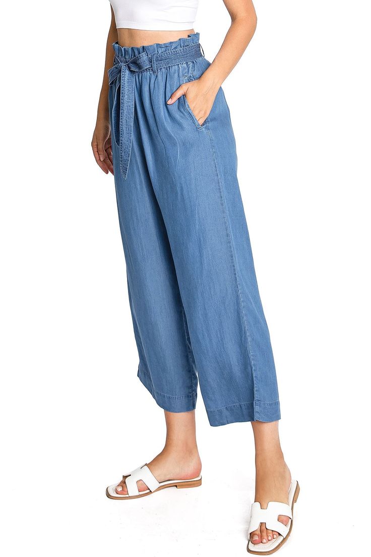 High waist?chambray culottes?with a paperbag waist, with a self-tie belt. Pleating at the top with pockets to the sides. CARE | Machine Wash ColdCONTENTS | 100% Tencel MEASUREMENTS | 36"/91 cm Top to Bottom 24"/61 cm Inseam 12"/30 cm Rise (Size Small) MODEL | 5'8 - wearing a size SmallIMPORTED Trendy Relaxed Fit Bottoms With Tie Waist, Trendy Bottoms With Tie Waist And Relaxed Fit, Chic Spring Waist-length Bottoms, Relaxed Fit Bottoms With Tie Waist For Spring, Trendy Tie Waist Workwear Bottoms, Trendy Workwear Bottoms With Tie Waist, High Waist Bottoms With Tie Waist In Solid Color, Versatile Solid Culottes For Spring, Spring Solid Wide Leg Pants With Tie Waist