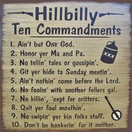 a wooden sign with instructions for ten commandments