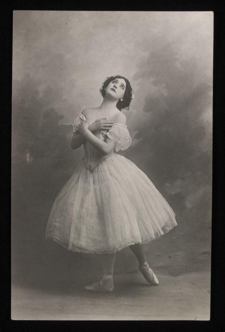 an old black and white photo of a ballerina