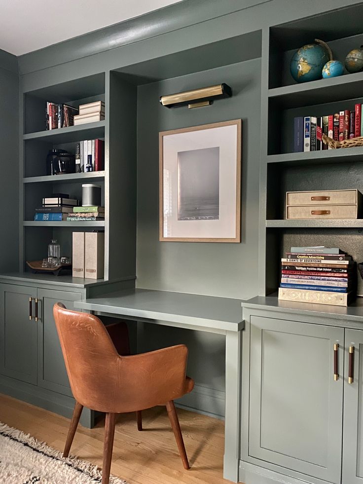 DIY built-in office shelves and cabinets Office Built In Around Window, Inbuilt Bookshelves And Desk, Small Study Built Ins, Built In Desk Lighting, Cabinet Bookcase Built Ins, Evergreen Fog Office Cabinets, Built In Bookshelves Color, Green Built In Desk, Green Cabinet Office