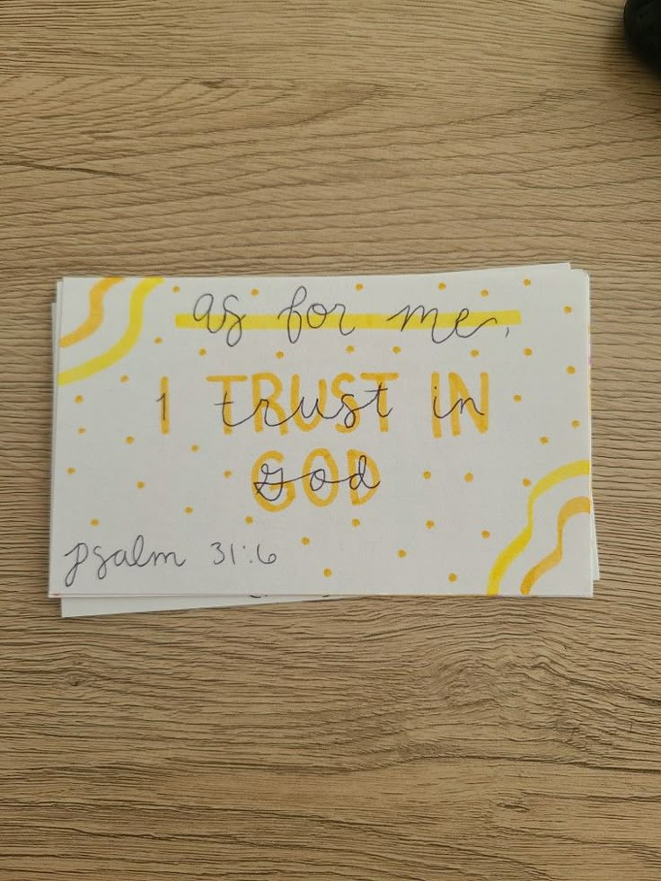 a piece of paper with the words trust in god written on it