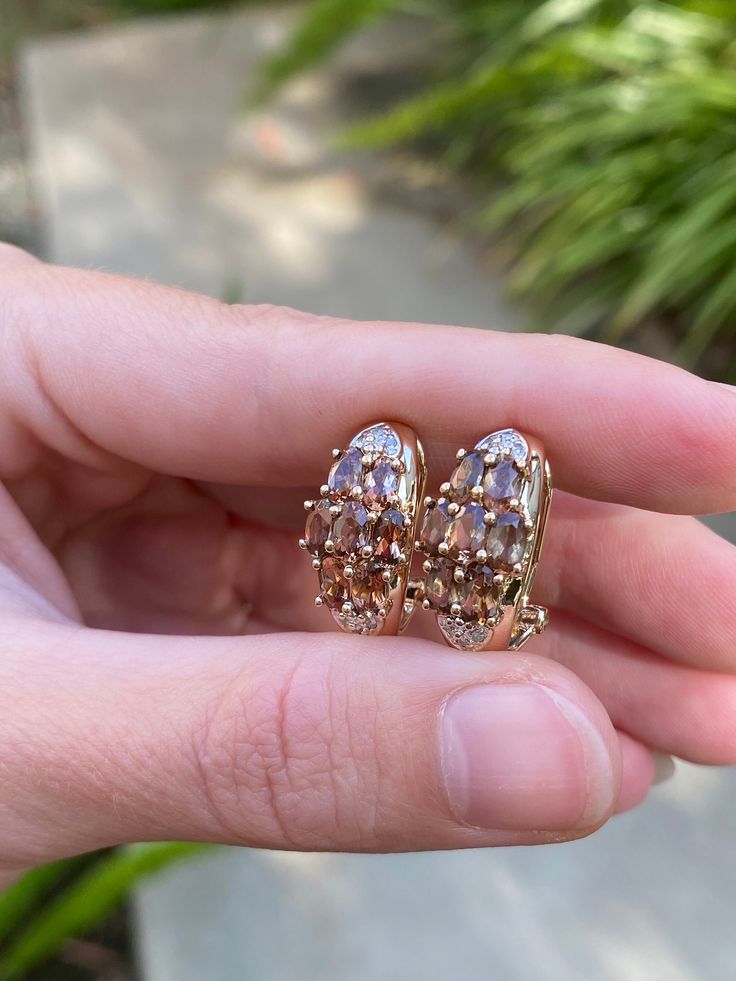 Total Weight: 5.8 grams  Length: 19.8mm Width: 8.7-4.7mm Tourmaline: 4x2.5mm Diamonds: Under 1mm, very small Condition: In great condition showing little wear with no damage. All metal has been thoroughly checked with an Olympus XRF spectrometer. It is guaranteed 14k gold. All our jewelry is properly washed and disinfected to ensure customers get clean items with every order.  Returns accepted but may be subjected to a restock fee.  Please message with any questions:) Formal Clip-on Huggie Jewelry, Rose Gold Marquise Earrings For Formal Occasions, Rose Gold Formal Earrings, Formal Fine Jewelry Huggie Earrings With Gemstones, Luxury Oval Huggie Earrings For Formal Occasions, Gia Certified Morganite Jewelry For Formal Occasions, Elegant Gemstone Huggie Earrings For Formal Events, Elegant Gemstone Huggie Earrings For Formal Occasions, Elegant Formal Huggie Earrings With Gemstone