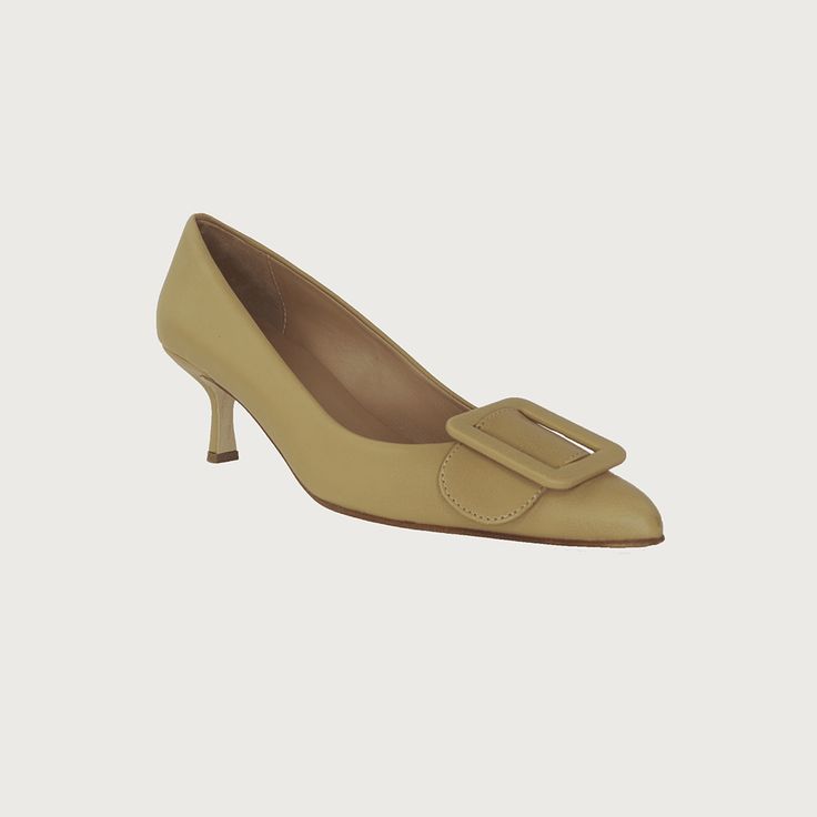 Experience the heightened allure of your everyday essential kitten heel, accentuated by a striking buckle that transforms it into a statement-making pump. It's worth noting, this style stands as our top-seller. The perfect pointy toe mid heel pump! Narrow at toe box Leather upper w/ leather buckle Leather lining Heel Height 2.5" Made in Italy Pointed Toe Calf Leather Heels With Buckle, Pointed Toe Calf Leather Heels With Buckle Closure, Chic 4-inch Kitten Heels For Fall, Calf Leather Low Heels With Buckle Closure, Low Heel Calf Leather Heels With Buckle Closure, Luxury Leather Kitten Heels With Buckle, Luxury Leather Kitten Heels With Buckle Closure, Luxury Kitten Heels With Buckle Closure For Formal Events, Luxury Heels With Buckle Closure For Office