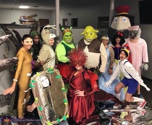 a group of people dressed up in costumes