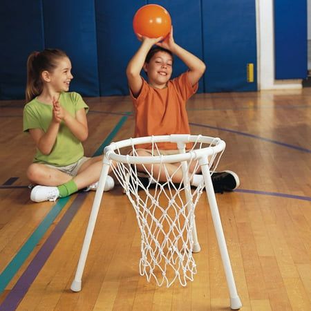 Great way to get all ages and ability levels involved in this popular game. Helps develop a sense of competition and encourages physical exercise. Made from heavy-wall PVC pipe and has an official cotton net. Includes a 9" sport ball. 14-1/2"H with a 15" hoop. Size: One Size.  Color: Multicolor. Basketball Training Equipment, Basketball Tricks, Basketball Shooting, Senior Activities, Gross Motor Activities, Basketball Net, Therapeutic Activities, Fun Arts And Crafts, Indoor Activities For Kids