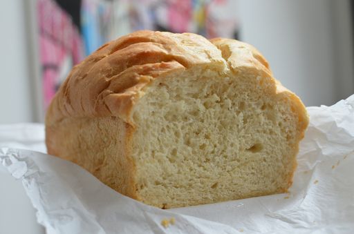 a loaf of bread sitting on top of a piece of paper