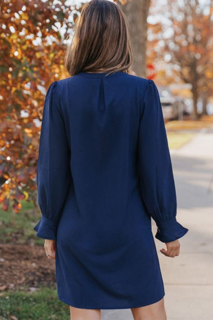 So versatile & flattering. Your all seasons go-to dress for work, church, to a dinner date or brunch. I have sold more than I can count and this navy color is my top seller. Perfect for travel too. Polyester Chic Navy V-neck Mini Dress, Chic Long Sleeve Navy Midi Dress, Chic Navy Long Sleeve Mini Dress, Chic Navy Long Sleeve Midi Dress, Solid Shift Mini Dress For Work, Knee-length Business Casual Fall Dress, Shift Mini Dress For Work, Business Casual Knee-length Fall Dress, Navy Mini Dress For Work