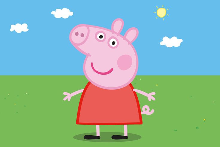 peppa pig standing in the middle of a field