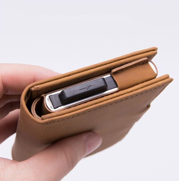 The Kito Vegan Wallet is the perfect minimalist, RFID blocking wallet. The built in ejector cardholder makes accessing your cards quick and easy. Traditional bifold wallets are more like a suitcase with all of the stuff shoved inside of them, whereas this slim wallet leaves no bulges in your pocket. FEATURES SLIM & MINIMAL Compact size reduces the strain on the spine helping to reduce back problems. BIG CARRY Comfortably load up to 8 cards and up to 10 folded bills without any compromise. RFID S Casual Cheap Trifold Wallet For Travel, Luxury Bifold Wallet For Everyday Use, Casual Cheap Trifold Wallet For Daily Use, Black Trifold Wallet With Cell Phone Pocket, Affordable Casual Trifold Travel Wallet, Cheap Minimalist Trifold Wallet, Cheap Casual Trifold Wallet For Travel, Cheap Trendy Bifold Card Holder, Affordable Modern Trifold Wallet For Everyday