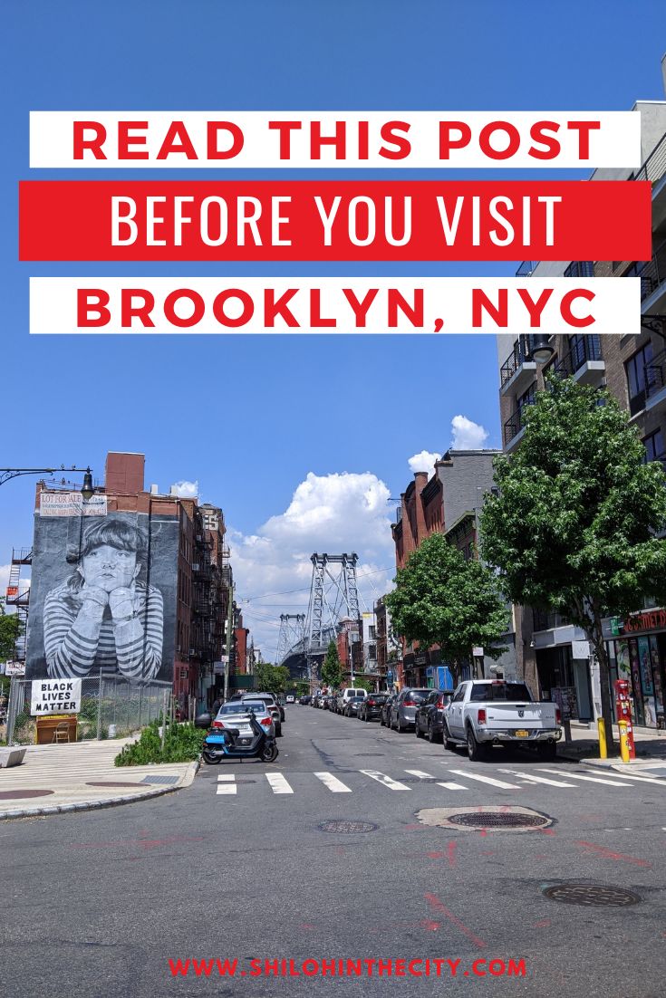 a street with cars parked on the side of it and a red sign that reads read this post before you visit brooklyn, new york