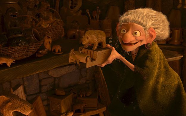 an animated character holding a wooden toy in front of a fire place with animals on it