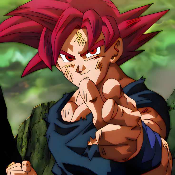 the young gohan is pointing his finger at something in front of him, while he looks