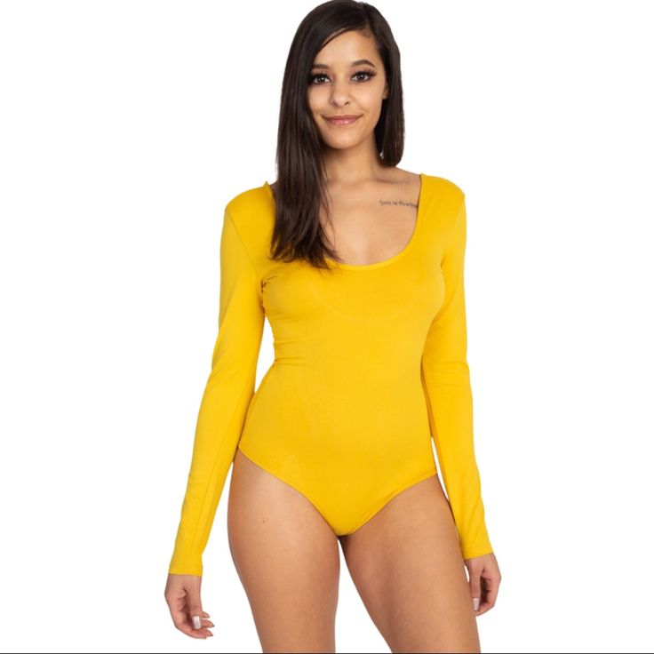 Stretch Longsleeve Scoop Neck And Scoop Back Polyester 92% Spandex 8% Yellow Fitted Long Sleeve Bodysuit, Yellow Long Sleeve Fitted Bodysuit, Fitted Yellow Long Sleeve Bodysuit, Casual Yellow Long Sleeve Bodysuit, Yellow Casual Bodysuit For Spring, Casual Yellow Bodysuit For Spring, Fitted Yellow Bodysuit Casual Style, Trendy Yellow Stretch Bodysuit, Fitted Yellow Casual Bodysuit