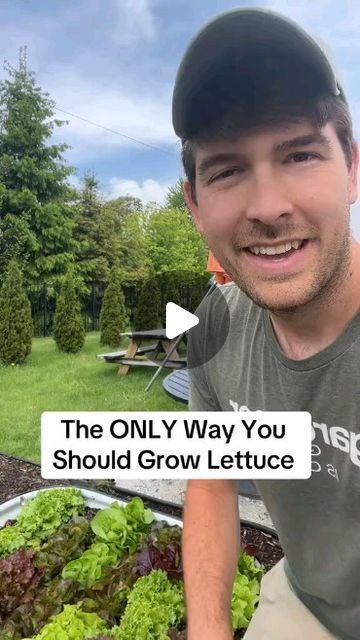 a man is smiling and holding lettuce in his hands with the words, the only way you should grow lettuce