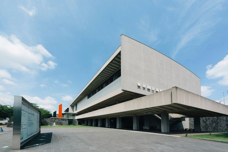 an empty parking lot in front of a building