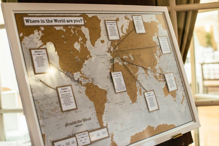 a world map is on display in front of a window with the words where in the world are you