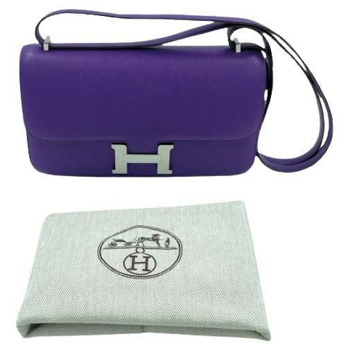 Stunning Hermès Constance Elan bag in purple crocus Epsom leather. Comes in its original HERMES dustbag ! Condition : very good Made in France Collection : Constance Elan Gender : woman Material: Epsom leather Color : crocus Measurements : 25 x 15 x 5.5 cm Shoulder strap : short : 67 cm, long : 118 cm Letter : P in a square Year : 2012 Hardware : silver finish metal Details: can be worn on the shoulder or cross-body. Luxury Purple Shoulder Bag With Silver-tone Hardware, Purple Bags With Silver-tone Hardware For Shopping, Classic Purple Rectangular Bag, Luxury Purple Bags With Palladium Hardware, Purple Shoulder Bag With Silver-tone Hardware For Evening, Classic Purple Evening Bag, Luxury Purple Rectangular Bag, Purple Satchel With Silver-tone Hardware, Evening Bags With Silver-tone Hardware In Purple