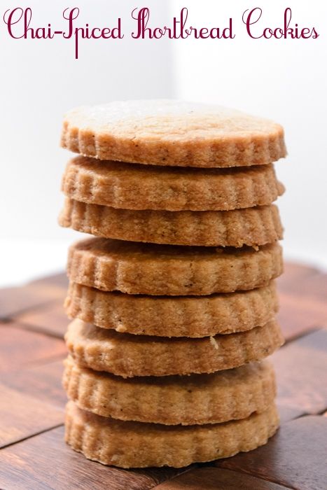 a stack of shortbread cookies sitting on top of a wooden table