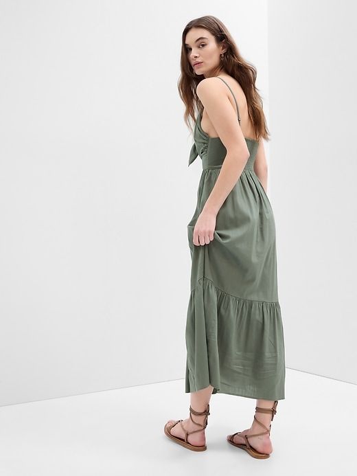 Tie-Front Tiered Maxi Dress | Gap Factory Cotton Midi Dress With Smocked Back And Spaghetti Straps, Cotton Midi Dress With Spaghetti Straps And Smocked Back, Casual Summer Suspender Dress With Ruffled Straps, Casual Maxi Sundress With Knotted Straps, Cotton Sundress With Adjustable Straps For Casual Wear, Cotton Suspender Dress With Spaghetti Tie Straps, Cotton Suspender Dress With Tie Straps For Day Out, Casual Beach Suspender Dress With Tie Straps, Casual Dresses With Spaghetti Straps And Smocked Back