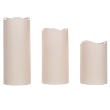 three white vases sitting next to each other