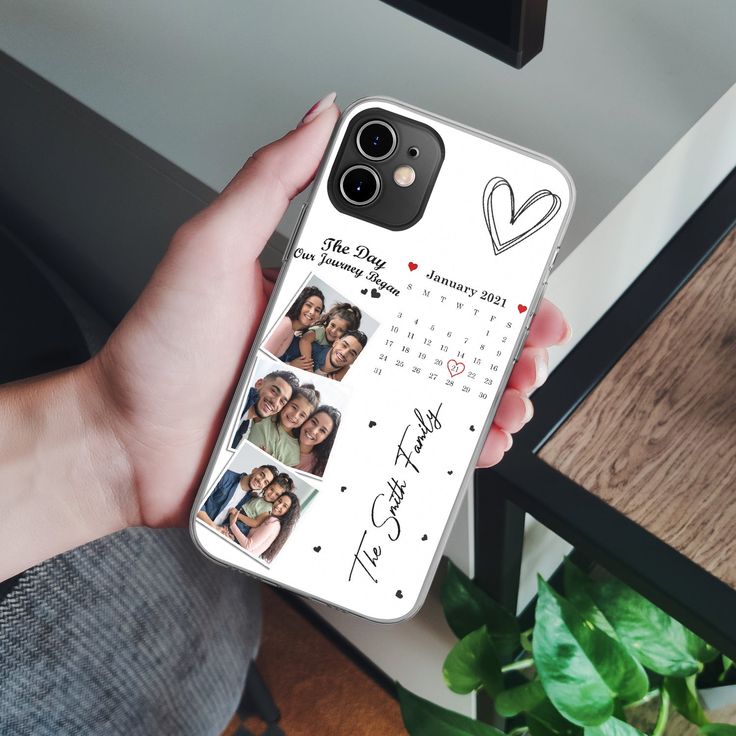 a person holding an iphone case with photos on it