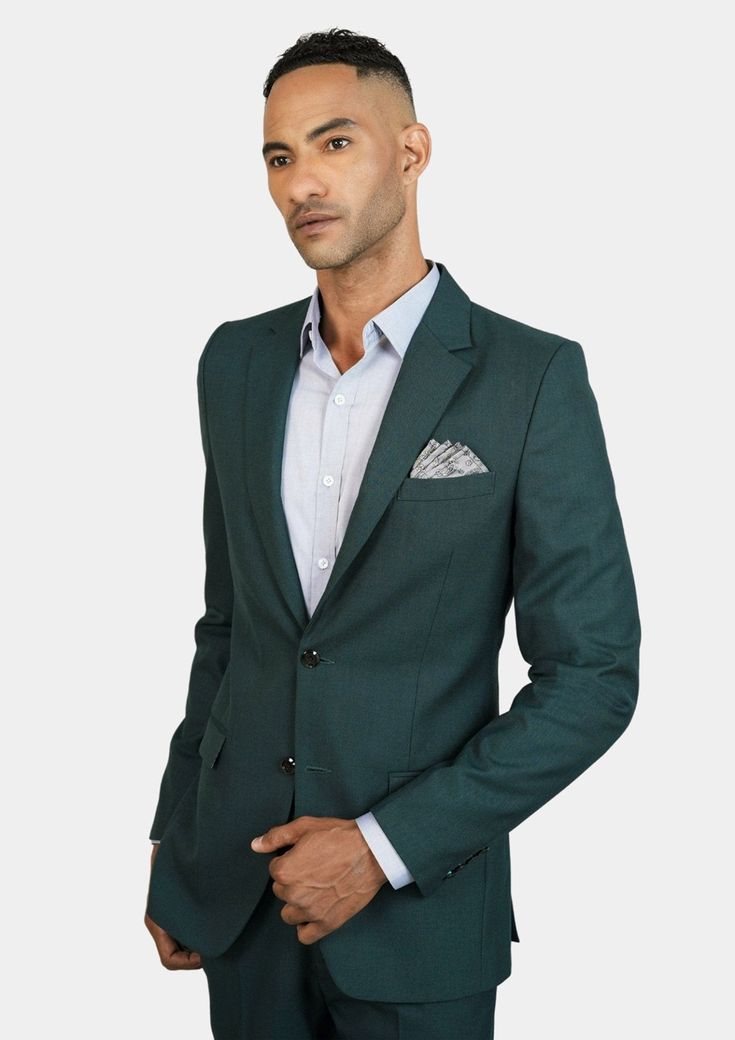 A popular favorite, the distinctive Sacramento green wool suit is bold in color with a premium fabric blend. This suit has it all. Make it yours today. Luxury Green Formal Suits, Luxury Green Semi-formal Blazer, Green Luxury Blazer For Formal Occasions, Luxury Green Formal Blazer, Elegant Green Semi-formal Blazer, Luxury Green Suit For Workwear, Elegant Green Suit With Pressed Crease, Luxury Single-breasted Green Suits, Elegant Tailored Dark Green Blazer