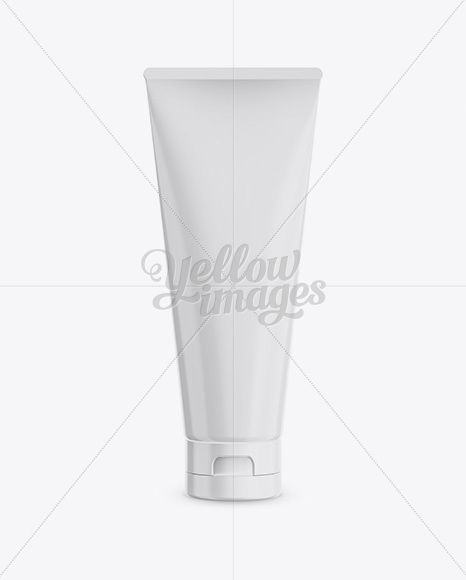 a tube of yellow images hand cream on a white background