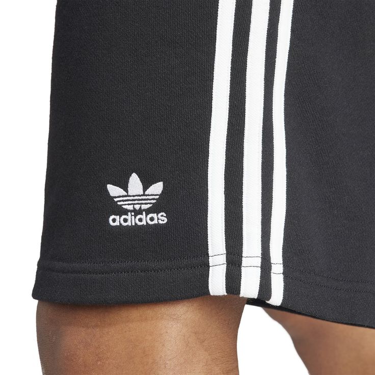 Three stripes for the win! In the adidas 3-Stripe Men's Shorts, you'll be repping your brand with these shorts that are so obviously adidas with their three-stripes. The elastic waistband means they'll stay up well but doesn't require you to be uncomfortable with a button or tight fit. These are ideal for on and off the court and are easy to match with a tee or even a hoodie (if you're into that look in the winter).Features: Features three stripes down side. Has adidas logo on the leg. Elastic w