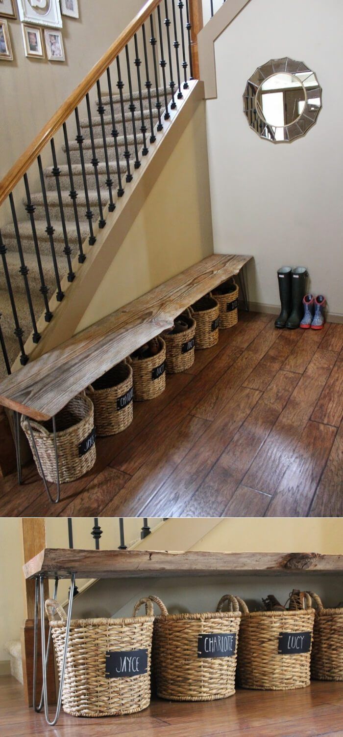 the entryway is decorated with baskets and benches