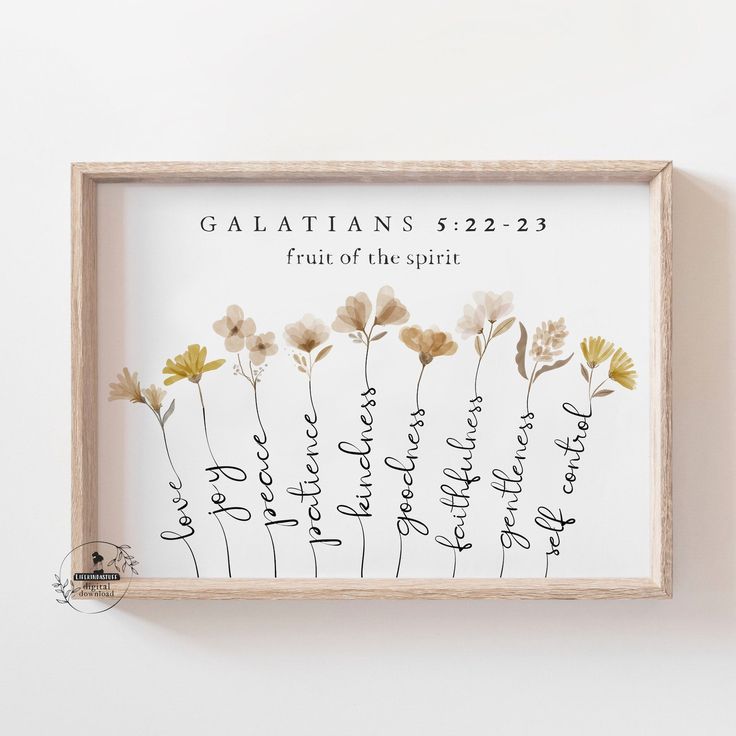 a wooden frame with flowers and the words galatian's 522 - 23