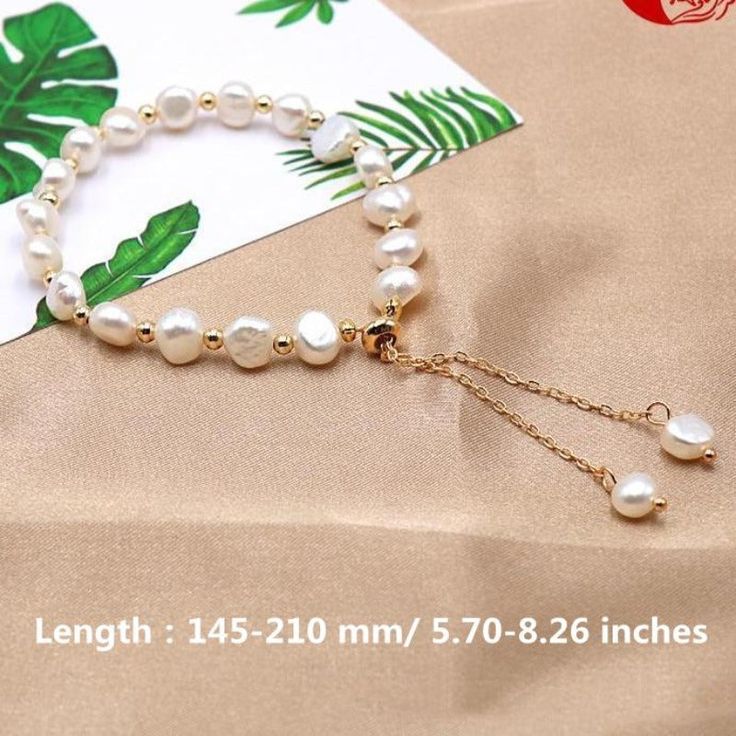 This beautiful Freshwater pearl bracelet ranges between 10-11mm in size and consists of beautiful and lustrous pearls in AAAA+ quality. All pearls in this bracelet are round and are strung with silk thread and double-knotted between each pearl. Known as the 'icon' of cultured pearls, Freshwater pearls have graced the necks, ears, fingers, and wrists of women for decades. Huge Tomato imports their Freshwater pearls from the Freshwater rs of Japan, grown in the Pinctada fucata oyster. All of our F Adjustable Pearl Bracelet With Pearl Pendant For Wedding, Elegant Bracelet With Baroque Pearl Charm, Baroque Pearl Bracelet With Pearl Drop, Adjustable Pearl Bracelet With Pearl Pendant, Adjustable Pearl Bracelets With Pearl Pendant, Adjustable Bracelet With Pearl Pendant, Elegant Adjustable Bracelet With Pearl Pendant, Adjustable Dainty Baroque Pearl Bracelet, Elegant Adjustable Bracelets With Pearl Pendant