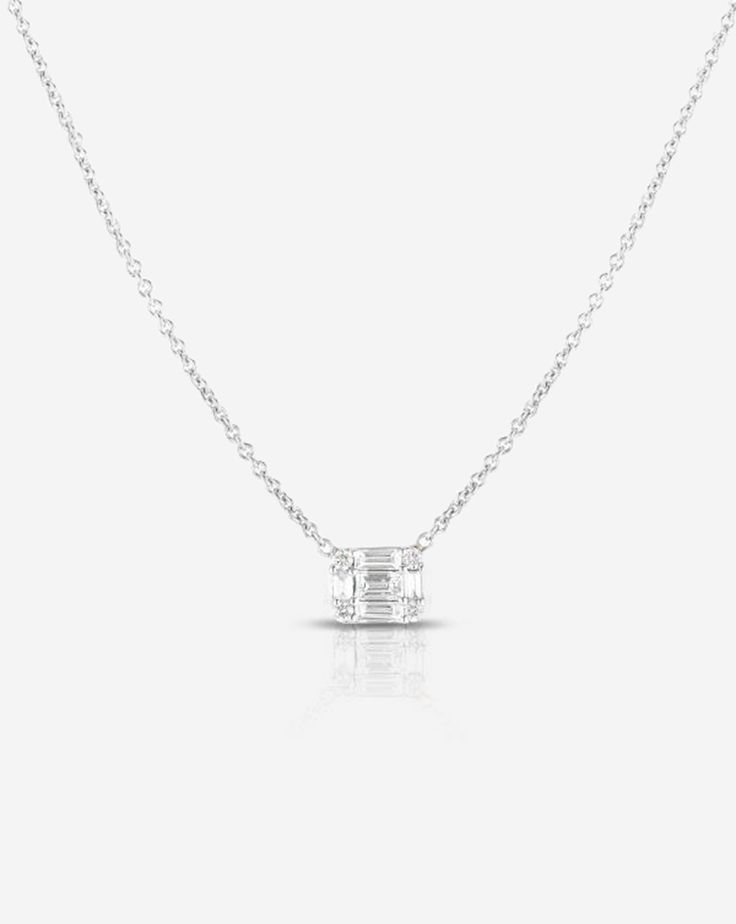 Petite Emerald Illusion Necklace – Ring Concierge Timeless Diamond Jewelry With Baguette Diamonds, Modern White Gold Diamond Necklace With Baguette Diamonds, White Baguette Cut Diamond Necklace, Timeless Emerald Cut Solitaire Necklace In Diamond White, Timeless Emerald Cut Diamond White Solitaire Necklace, Modern Diamond White Jewelry With Baguette Diamonds, Baguette Cut Solitaire Diamond Necklace, Timeless Baguette Diamond Accented Jewelry, Classic Cubic Zirconia Diamond Necklace With Emerald Cut