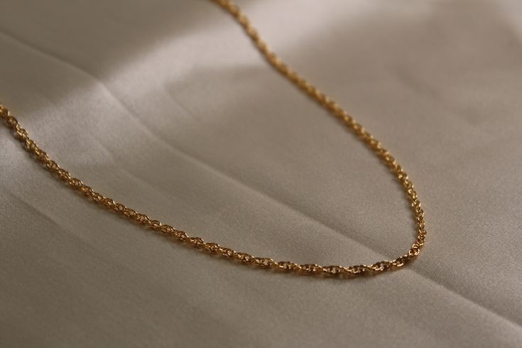 14k gold filled rope chain unisex gold chain available in different lengths Classic Rope Chain Necklace With Oval Link, Classic Oval Link Rope Chain Necklace, Elegant Rope Chain Link Jewelry, Classic Yellow Gold Rope Chain Jewelry, Elegant 14k Gold Tarnish Resistant Rope Chain Necklace, Classic Necklaces With Oval Link Rope Chain, Yellow Gold Plated Rope Chain Necklace, 14k Gold Link Rope Chain Necklace, Yellow Gold Jewelry With Rope Chain Link