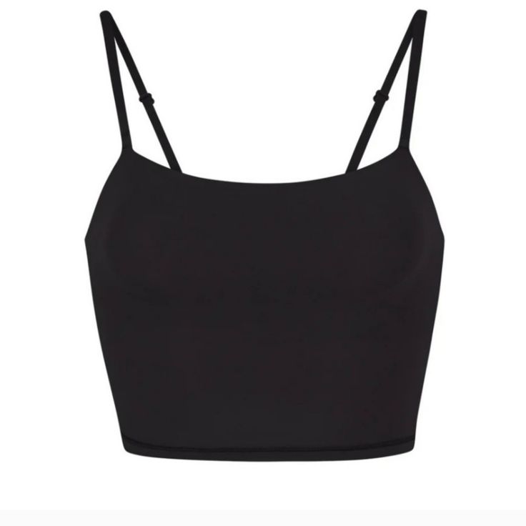 Brand New In Sealed Bag Skims Onxy Color...Black Crop Cami. Adjustable Straps. Soft And Comfy. Cute With Bf Shorts Or Pants In Separate Lising. See Photos For More Details. No Movement In Price On This Item Due To Posh Fees Black Everyday Crop Top, Bra Friendly, Everyday Black Bra-friendly Crop Top, Black Everyday Bra-friendly Crop Top, Black Bra-friendly Crop Top For Everyday, Chic Black Crop Top With Straps, Elegant Black Crop Top With Adjustable Straps, Chic Black Crop Top For Everyday, Black Seamless Strappy Crop Top, Super Cropped Top