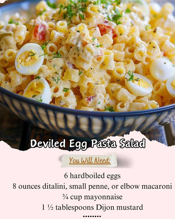 an egg pasta salad is shown in a bowl