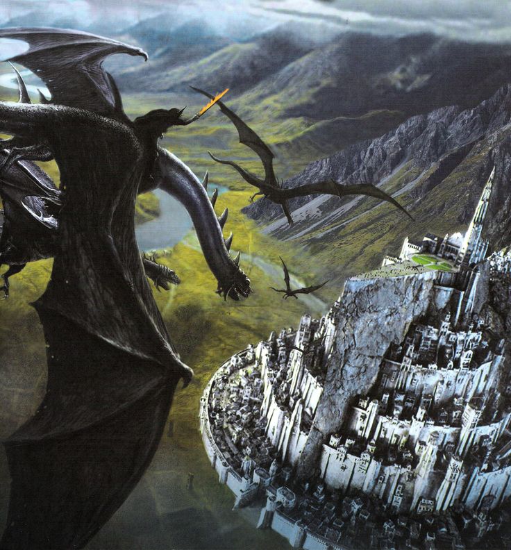 two black dragon flying over a city on top of a mountain