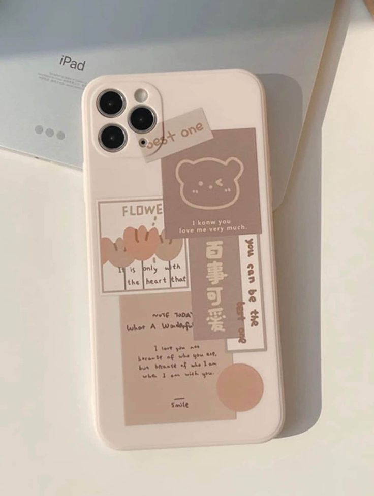 an iphone case with some stickers on it