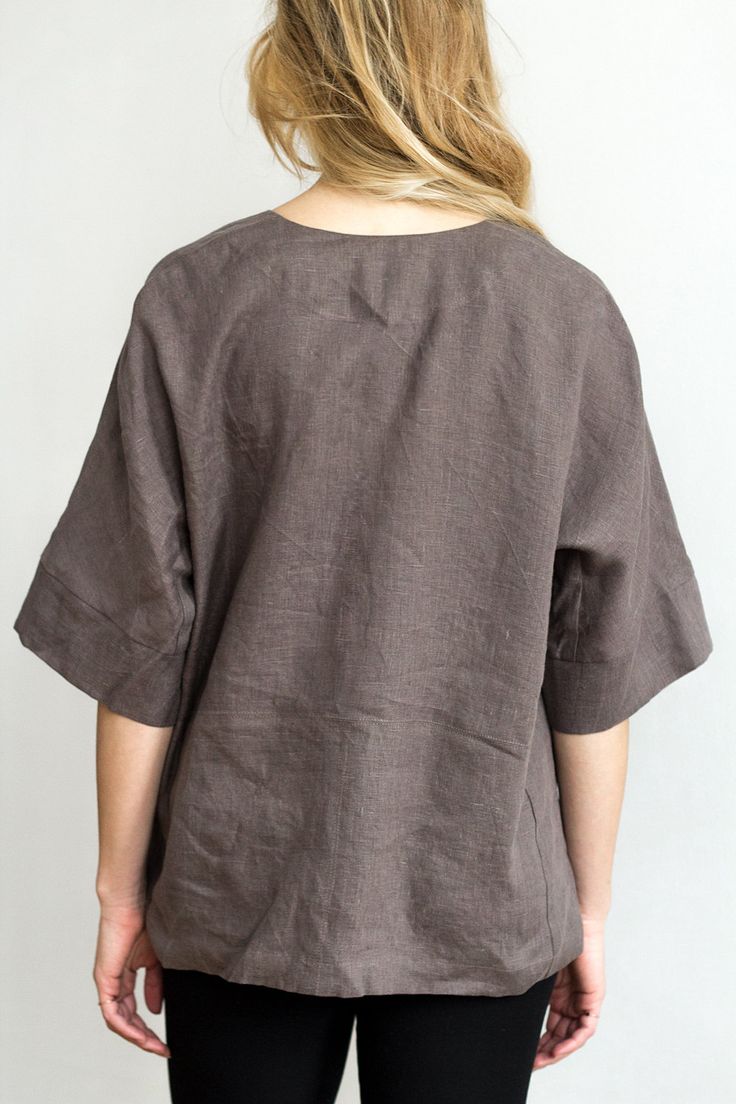 Brown Relaxed Fit Crew Neck Blouse, Oversized Brown Blouse With Short Sleeves, Oversized Short Sleeve Brown Blouse, Brown Oversized Short Sleeve Blouse, Relaxed Fit Tunic Top In Lagenlook Style, Relaxed Fit Lagenlook Tunic Top, Oversized Half Sleeve Tops For Workwear, Casual Relaxed Fit Tunic Tops, Casual Spring Tops With Set-in Sleeves