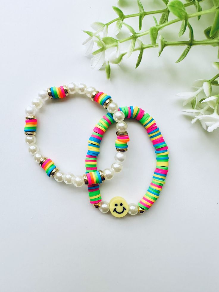 This bracelet pack is super cute, preppy and colorful Trendy Spring Bracelets For Party, Trendy Bangle Wristband, Cheerful Adjustable Multicolor Friendship Bracelets, Cheerful Multicolor Adjustable Friendship Bracelets, Playful Beaded Bracelets For Friendship In Spring, Playful Beaded Bracelets As Spring Gifts, Trendy Adjustable Multicolor Bracelet, Trendy Adjustable Multicolor Bracelets, Trendy Adjustable Multicolor Stretch Bracelet