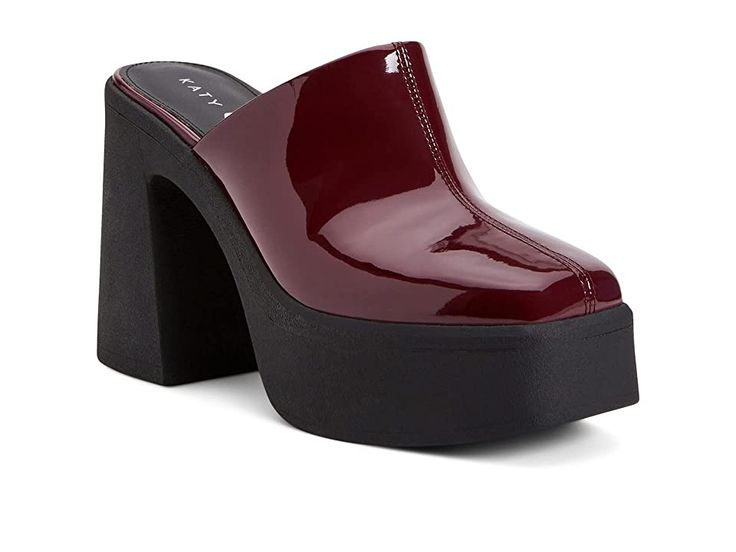 Katy Perry The Heightten Clog - High Heels : Burgundy : Going for a formal meeting or on a date, the Katy Perry The Heightten Clogs are a great choice to complete your look. Man-made upper and lining. Soft and padded insole for utmost comfort. Slip-on style. Square toe and chunky block heel. Rubber outsole with high traction and durability. Imported. Measurements: Heel Height: 4.3 in. Platform Height: 1.6 in. Single Shoe Weight: 0.3 oz. Formal Platform Clogs With Block Heel, Formal Clogs With Platform Block Heel, Modern Formal Platform Clogs, High Heel Platform Mules For Workwear, Formal Synthetic Clogs, Modern Clogs With Padded Heel, Modern Clogs With Padded Heel And Round Toe, Platform Clogs With Synthetic Material For Work, Formal Clogs With Padded Block Heel