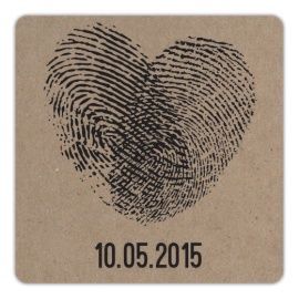 a heart shaped fingerprint on a brown paper with the date 10 05 2015 written in black