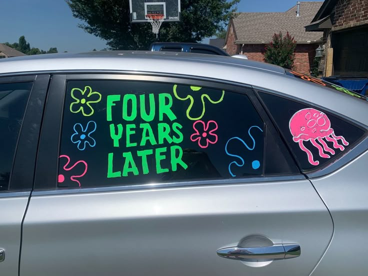 a car with four years later written on it